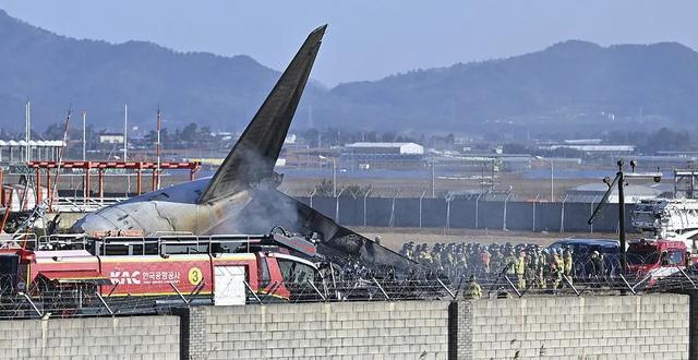 韩国否认机场跑道长度不足 事故致122人死亡